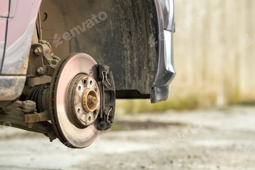 Preview: Closeup of braking disc of the vehicle with brake caliper for repair