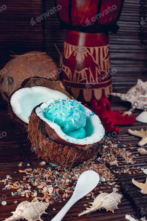 Preview: Blue ice cream in coconut bowl. Summer vacation
