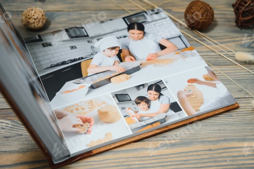 Preview: Luxury wooden photo book on natural background. Family memories photobook.