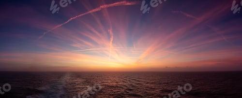 Preview: Dramatic Colorful Sunrise Sky over North Atlantic Ocean. Cloudscape Nature Background