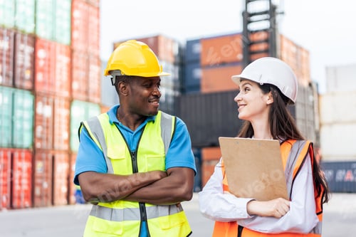 Preview: Caucasian businesswoman engineer working in container terminal port.