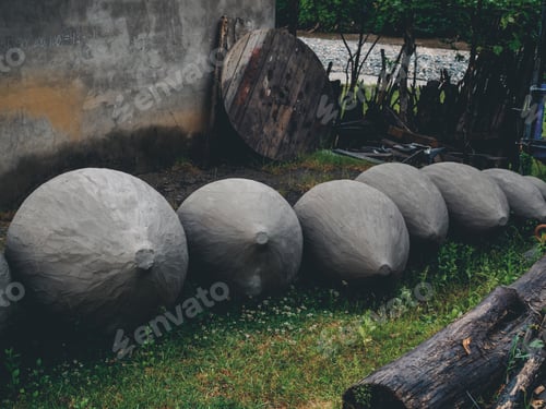 Preview: big clay cisterns for producing wine on grass in yard in georgia