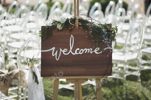 Preview: Romantic wedding ceremony on the beach. Sign welcome