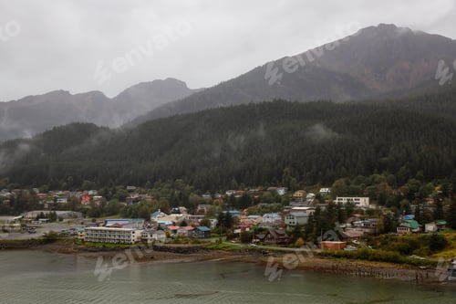 Preview: View of a small town, Juneau, during a cloudy morning with mountains in the background