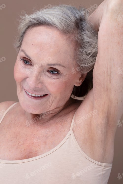 Preview: Studio shot of smiling senior woman