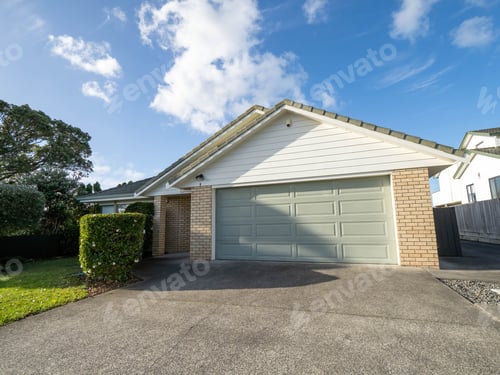 Preview: suburban garage with roller door under gabled roof