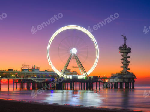 Preview: The Hague, Netherlands. Sea pier and Ferris wheel. Famous place on the beach in Holland.