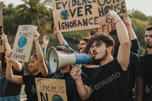 Preview: Group of diverse protesters holding banners with shouting balloon and megaphone illustration