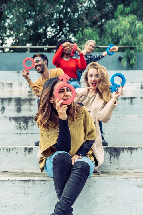 Preview: A Latina woman jokingly uses a female symbol as a magnifying glass.