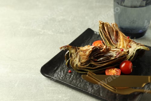 Preview: Concept of tasty food with grilled artichoke, space for text