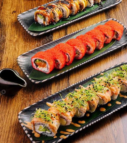 Preview: Colorful sushi rolls served on elegant plates at a bustling restaurant