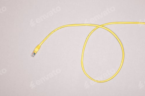 Preview: A single yellow ethernet cable