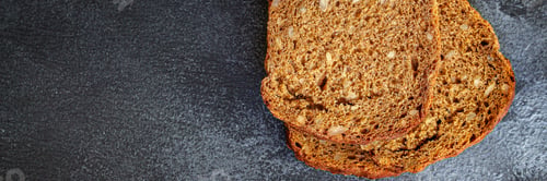 Preview: Black Rye Bread With Useful Additives And Seeds (Bakery Slices) Menu Concept Background. Top View