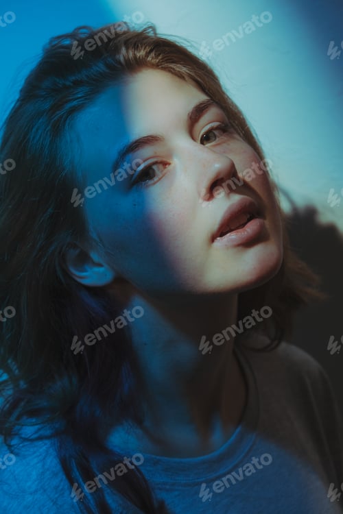 Preview: Portrait of beautiful Gen Z teen girl with freckles looking at camera.