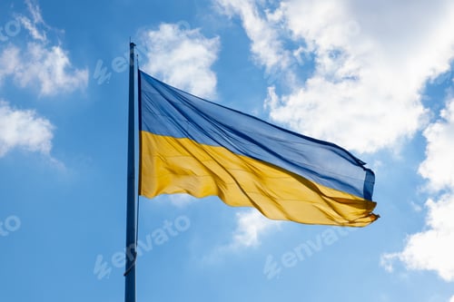 Preview: Flag of Ukraine flutters in blue sky. Large yellow blue Ukrainian national state flag. War