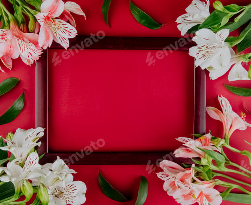 Preview: top view of an empty wooden picture frame with white and pink color alstroemeria flowers