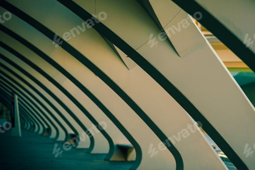Preview: Columns of white cement in a dark scene, as background of modernity and architecture.