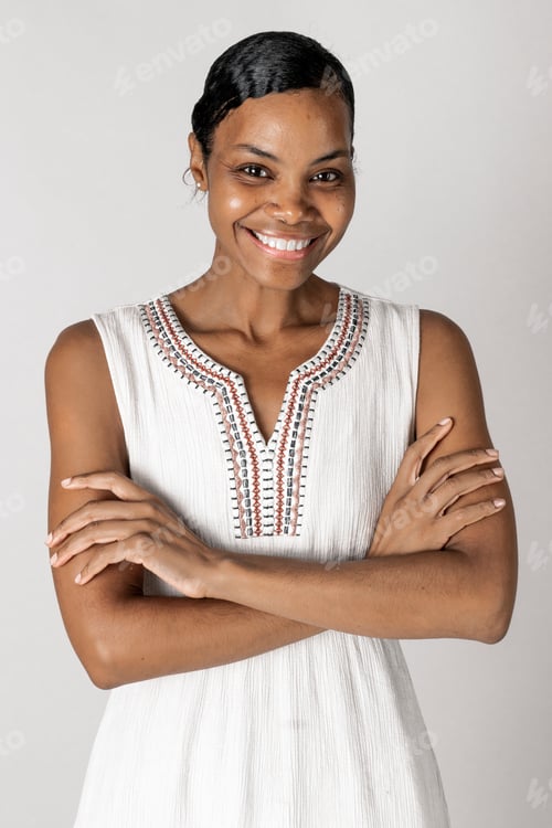 Preview: Happy black woman in a white dress