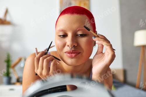 Preview: A young woman enjoys her self care routine while getting ready at home
