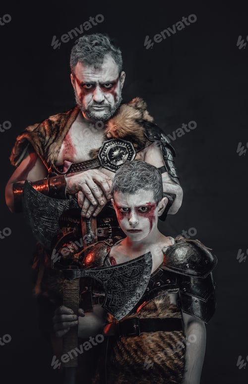 Preview: Military family a father and son armed with axes in studio