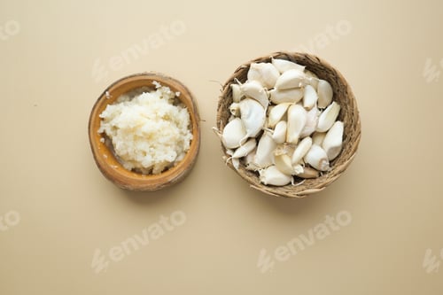 Preview: top view of minced garlic on color background