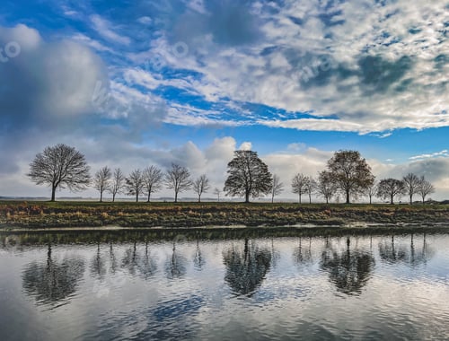 Preview: Trees and cloudscape on water reflection, Saint-Valery_sur_Somme, France