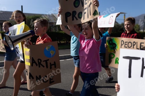 Preview: Group of elementary school pupils walking on a protest march