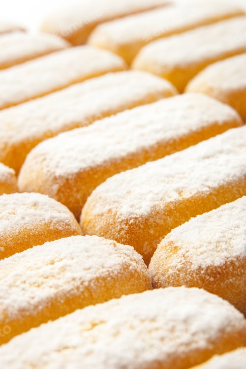 Preview: Cookies with powdered sugar background vertical