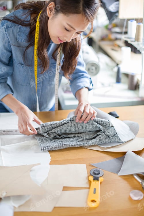 Preview: Fashion designer working in studio