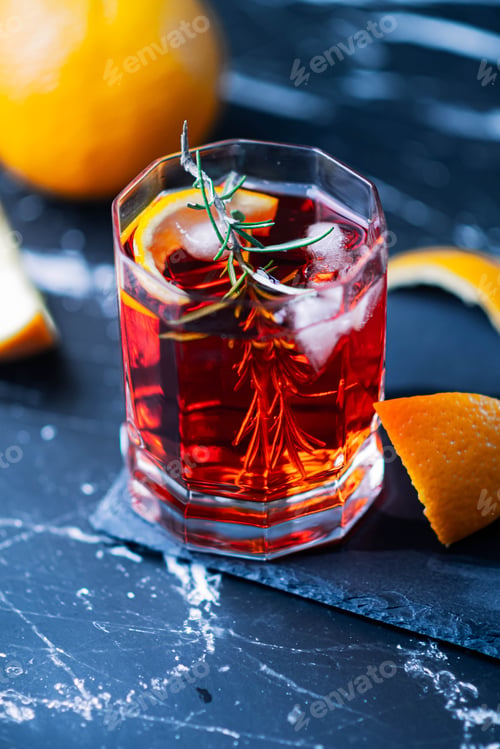 Preview: Vertical shot of a glass of gourmet citrus cocktail