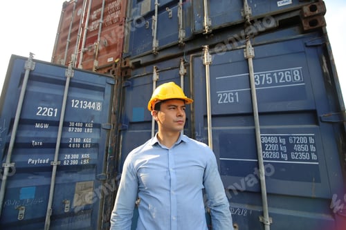 Preview: Engineer or supervisor checking and control loading Containers box from Cargo at harbor. Foreman con