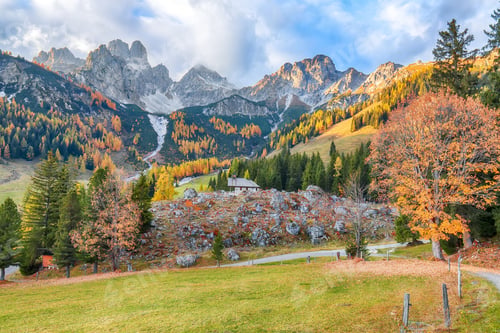 Preview: Gorgeous view of mountains and valleys with larch forest and wonderful sky are located in Filzmoos