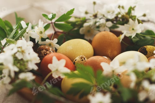 Preview: Happy Easter! Modern easter eggs with spring flowers in wooden bowl on rustic linen cloth. Aesthetic