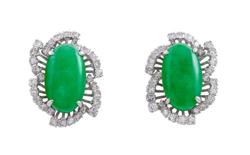 Preview: Closeup shot of beautiful diamond and sapphire earrings isolated on a white background