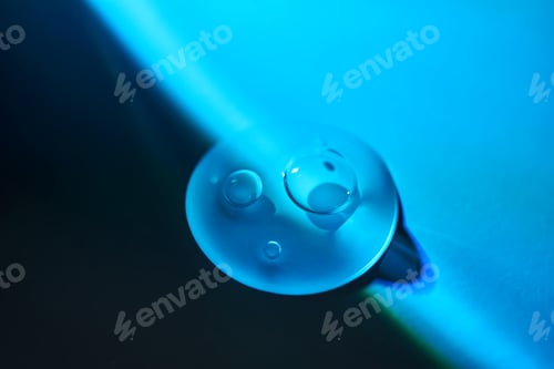Preview: A drop of night facial serum.