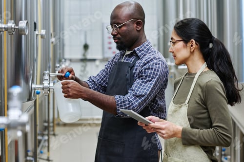 Preview: Couple of engineers tasting brewed beer