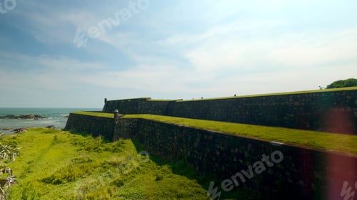Preview: Fort's exterior wall in Kinsale, Ireland. Action. Stone fortress and the sea shore.