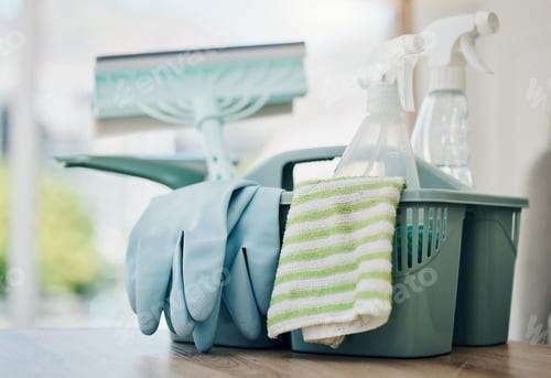 Preview: Shot of a basket with cleaning supplies on a table