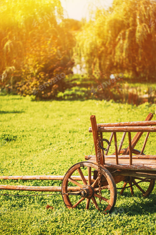 Preview: Garden Decoration Concept. Decorative Garden Wagon On Summer Lawn. Bright Sunny Day. Gardening And