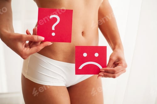 Preview: Health. Woman Body In Underwear With Question Card Near Belly.