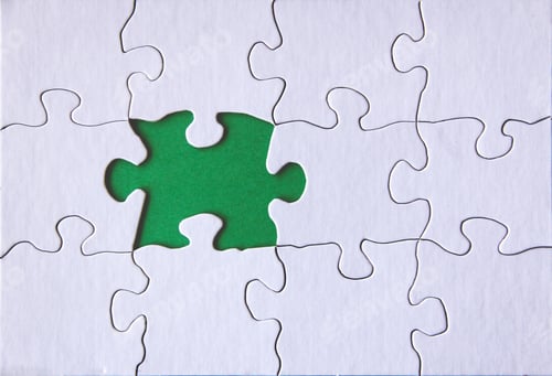 Preview: White Jigsaw puzzle with green space for text overlay mockup friendly background with copy space