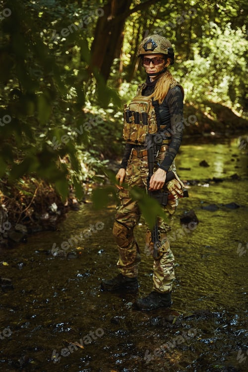 Preview: Soldier in camouflage grouping walking through reservoir