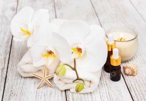 Preview: Spa products with white orchids flowers