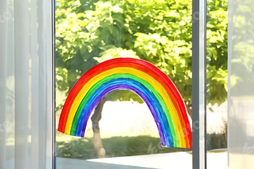 Preview: Painting of rainbow on window indoors. Stay at home concept