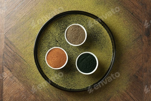 Preview: Different superfood powders in bowls on wooden table, top view