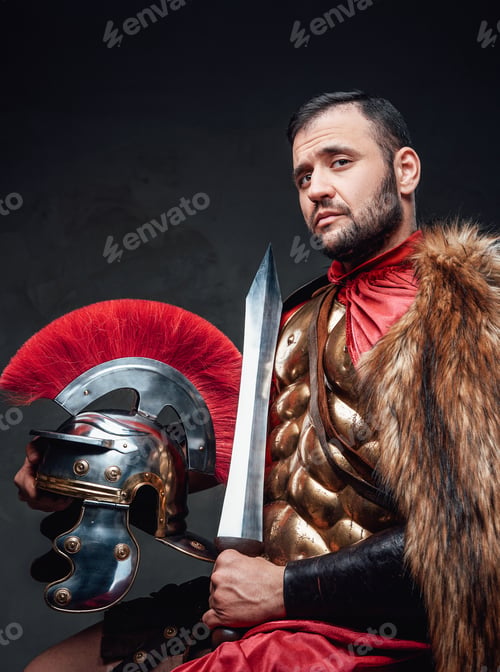 Preview: Studio shot of roman officer with sword and helmet