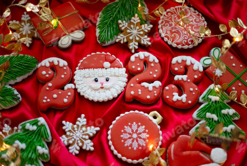 Preview: Banner for Christmas and New Year gingerbread cookies numbers 2023, snowflakes, Santa hat