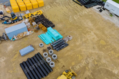 Preview: Preparation for installation works in plastic PVC pipes lying on the construction site ground