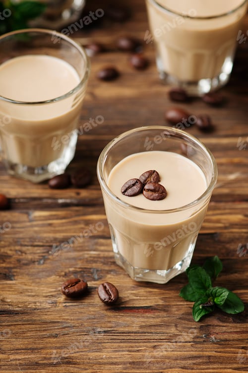 Preview: Cold cream with coffe and mint on the wooden table