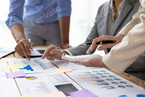 Preview: Financial consulting business meeting together to discuss financial chart analysis.